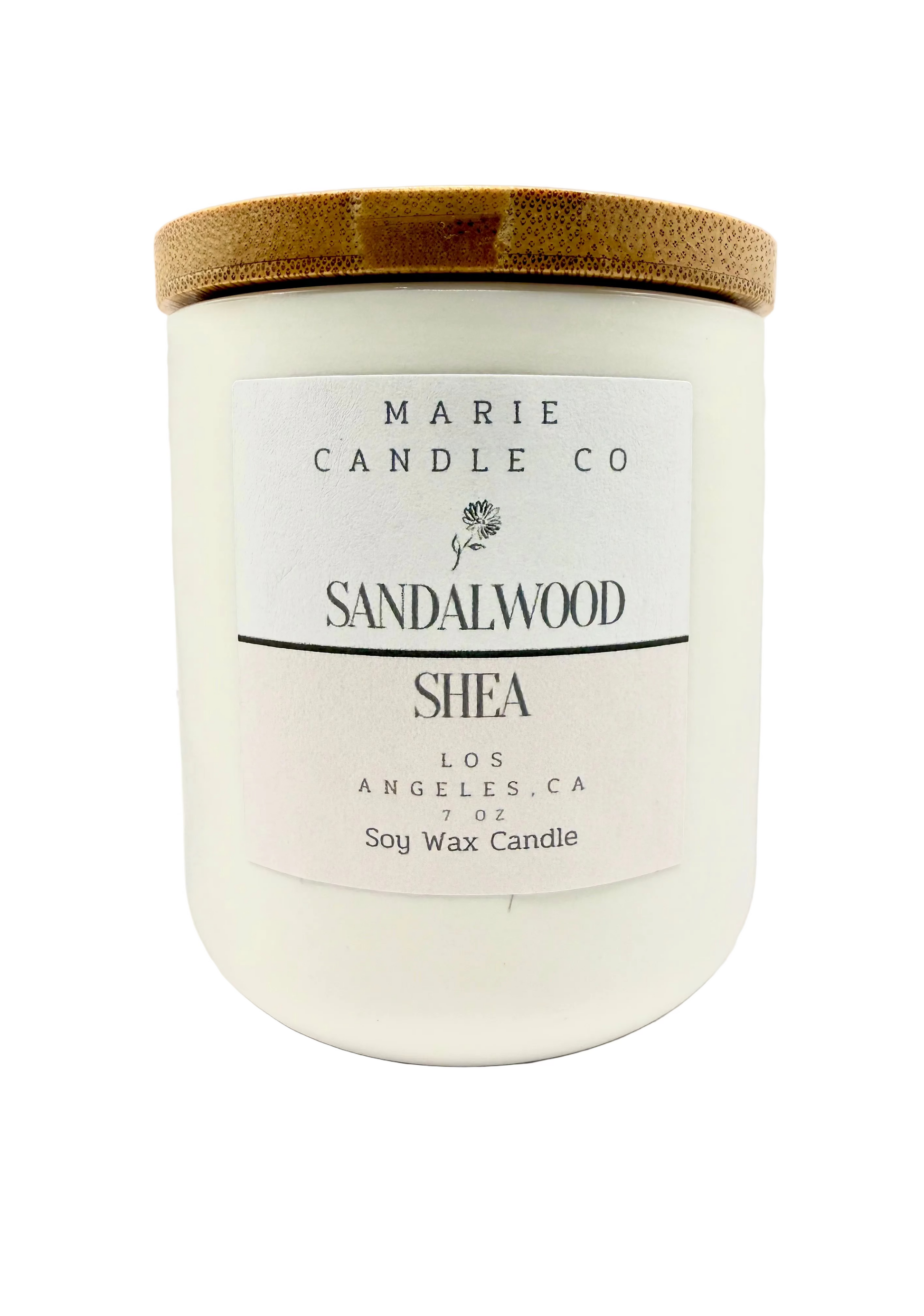 Marie Candle Co sandalwood candle with wooden lid on a white background